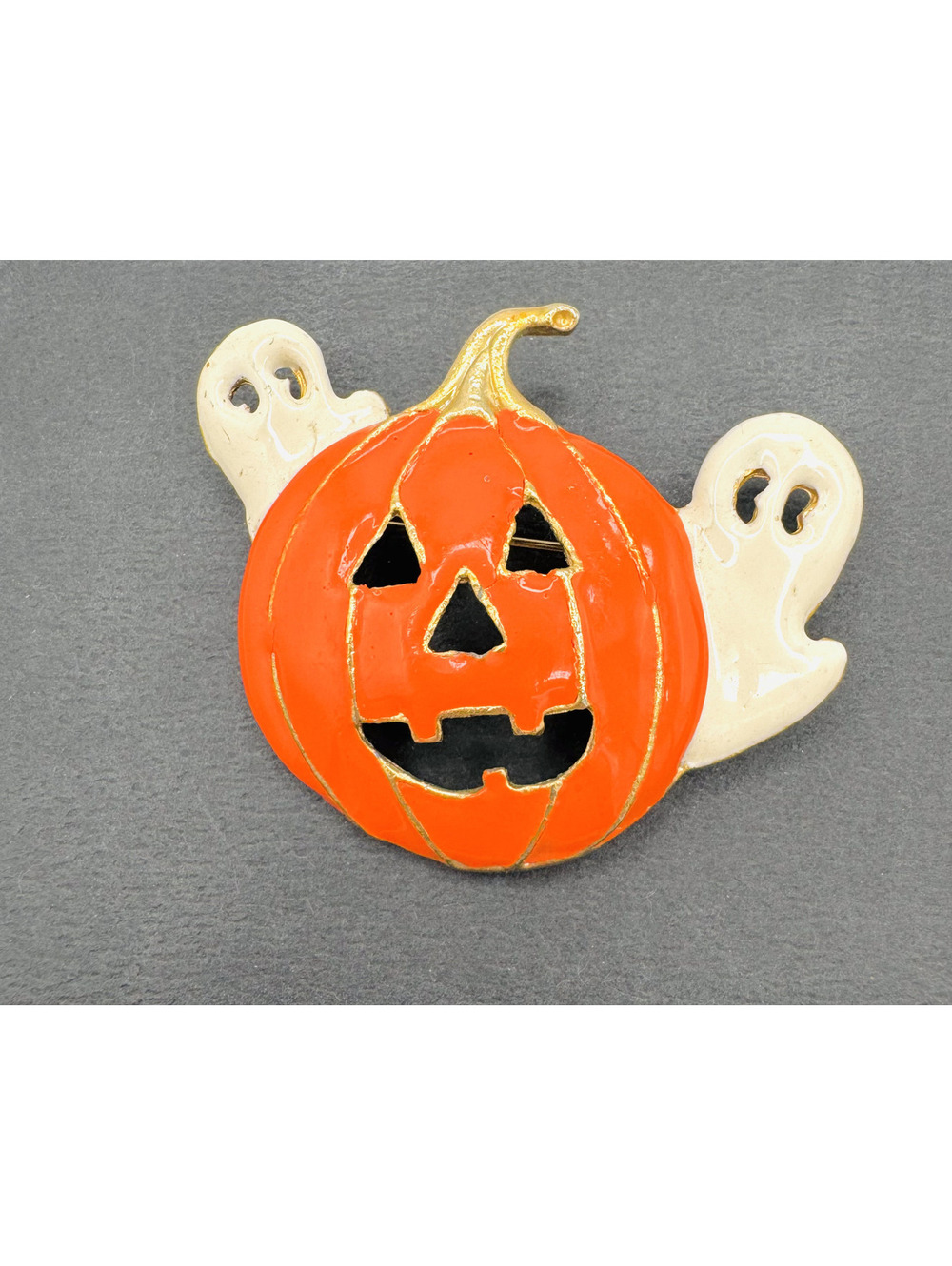 Vintage glossy enameled orange jack-o-lantern and white ghosts pin/brooch